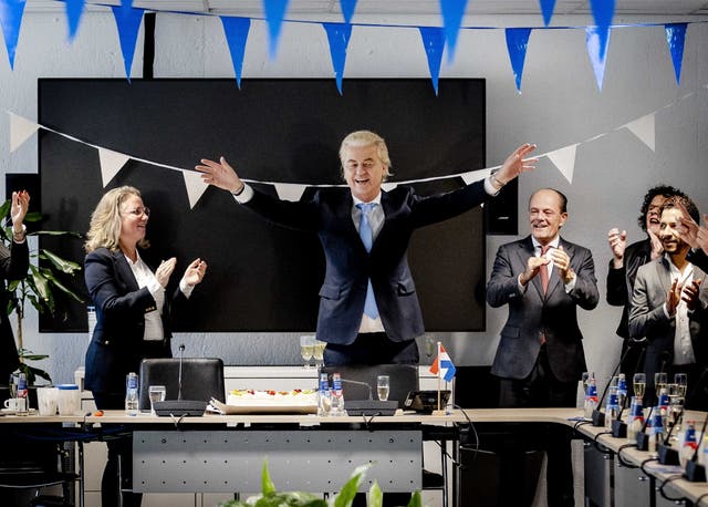 <p>Leader of Freedom party (PVV) Geert Wilders (C) gestures next to Dutch MP Fleur Agema (L) one day after the House of Representatives elections, The Hague, Netherlands, 23 November 2023.</p>