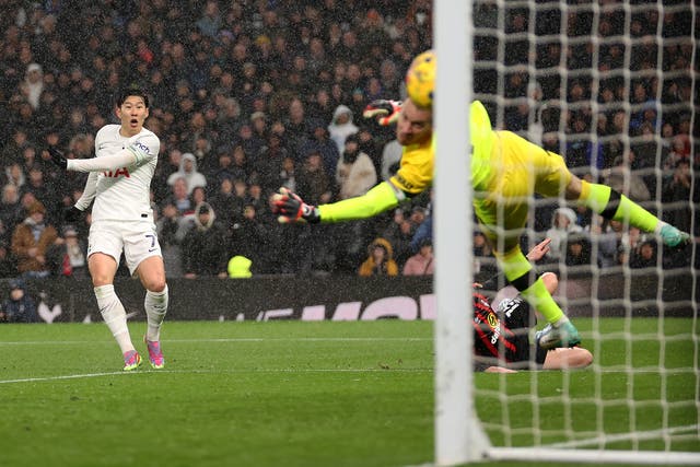 <p>Son Heung-min curls one past the keeper for Spur’s second goal on Sunday </p>