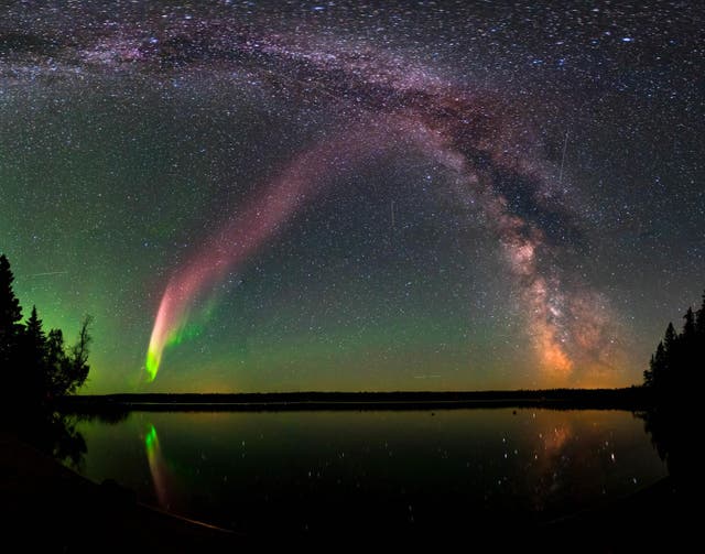 <p>Representational Image: The Strong Thermal Emission Velocity Enhancement, visible as a pink band rising from the lower left to upper right of this photograph, appears with the Milky Way over Childs Lake, Manitoba, Canada.</p>