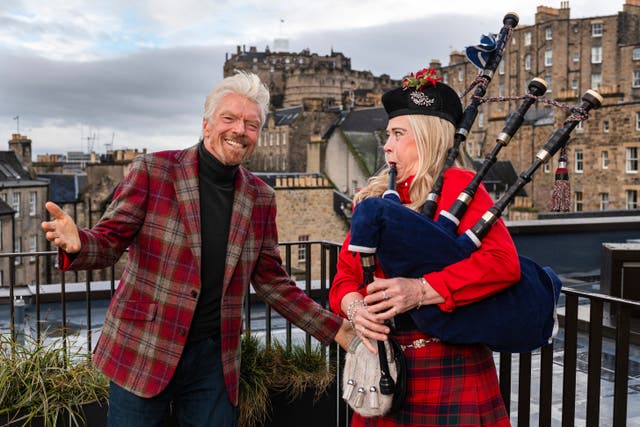 <p>Richard Branson and piper Louise Marshall celebrates the opening of his new hotel in Scotland </p>