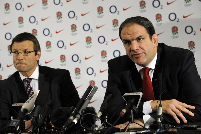 Martin Johnson (right) announced his resignation as England rugby union team manager on this day in 2011 (Rebecca Naden/PA)