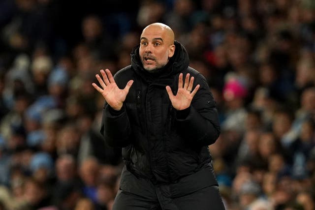 Pep Guardiola is pleased to have fewer fixtures in January (Martin Rickett/PA)