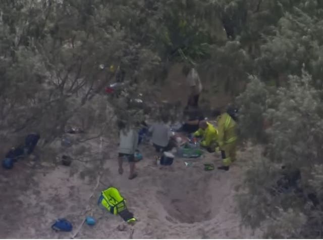 <p>Paramedics report to the scene where a man got buried alive in sand in Australia</p>