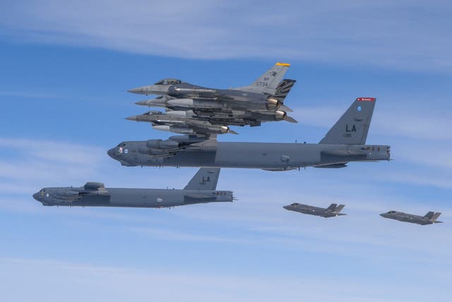<p>File - In this photo provided by the South Korean Defense Ministry, U.S. B-52H bombers, center, and F-16 fighter jets and South Korean Air Force F-35A fighter jets, right bottom, fly over the Korean Peninsula during a joint air drill in South Korea on April 14, 2023. (South Korea Defense Ministry via AP, File) </p>