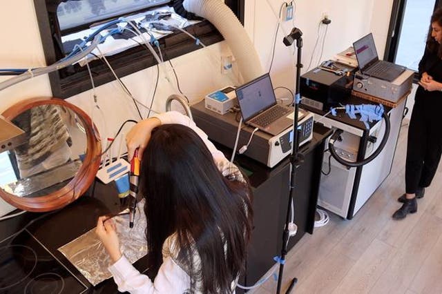 <p>Within a residential archiectural engineering laboratory, Purdue researchers studied how various hair care products can release chemicals that linger in the air after use</p>