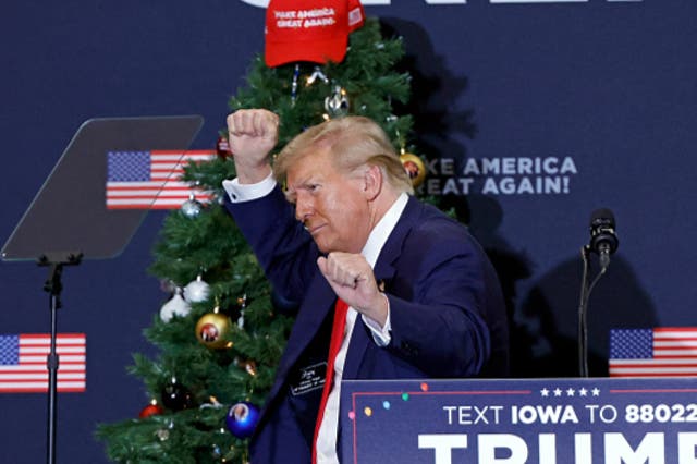 <p>Former US President and 2024 presidential hopeful Donald Trump gestures during a campaign event in Waterloo, Iowa, on December 19, 2023</p>