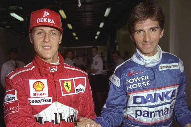 <p>Michael Schumacher (left) and Damon Hill in 1997</p>