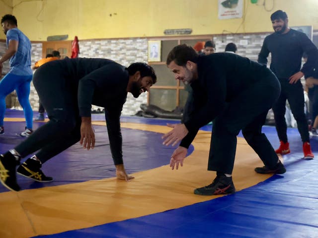 <p>Indian National Congress leader Rahul Gandhi (R) with Olympic medalist wrestler Bajrang Punia in Haryana, India</p>