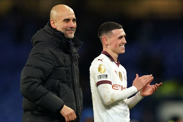 <p>City manager Pep Guardiola with young talent Phil Foden</p>